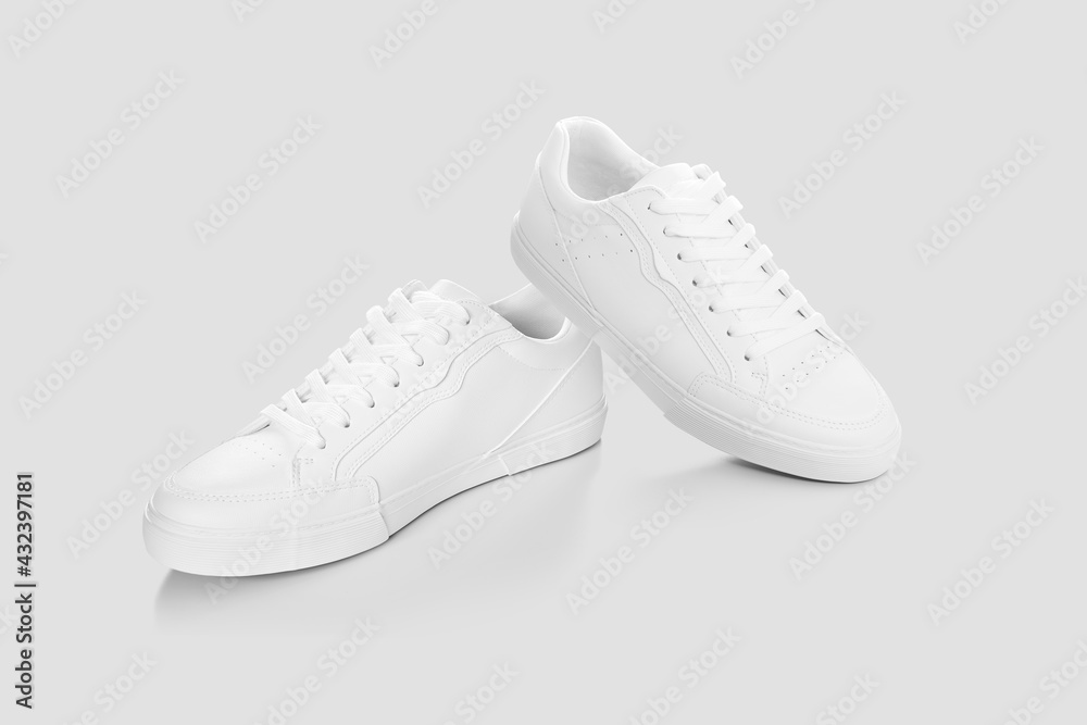 Mockup of a pair of sneakers isolated against a plain background