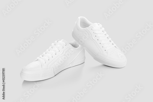 Mockup of a pair of sneakers isolated against a plain background