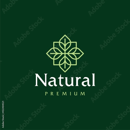 Abstract ornamental green mandala or flower swirl leaf logo icon vector design. Elegant premium ornament vector logotype symbol.
