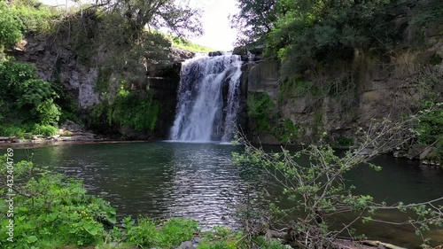 Salabrone waterfalls in Farnese (VT).
Aerial shot of the waterfalls and the pond immersed in the thick veggetation. photo