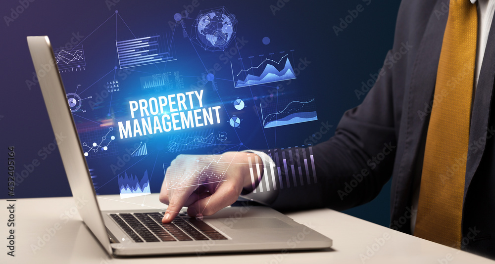 Businessman working on laptop, business concept Businessman working on laptop, business concept