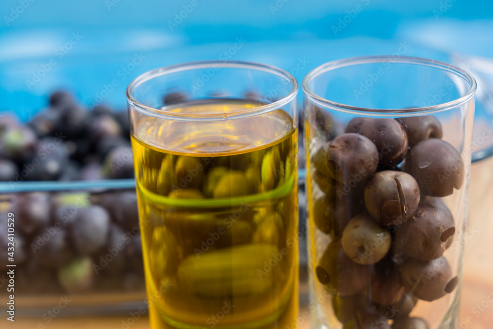 harvest of olives in the garden and production of tasty cold-pressed olive oil