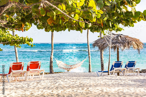 Beach chairs and hammock on Guardalavaca beach, Holguin, Cuba photo