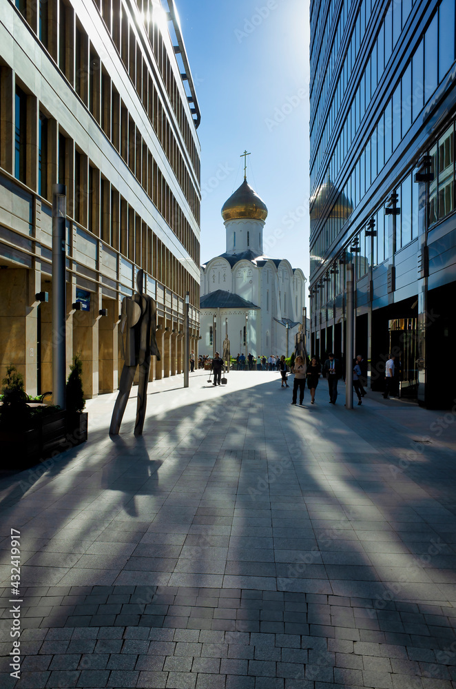 Moscow, Russia - May 28, 2018: Modern White square district with beautiful St. Nicholas church in the centre of Moscow, Russia