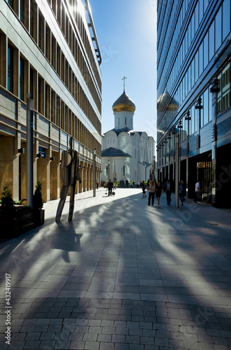Obraz na płótnie Moscow, Russia - May 28, 2018: Modern White square district with beautiful St. Nicholas church in the centre of Moscow, Russia w salonie