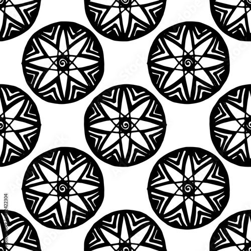 vector seamless pattern of a multibeam star in a circle drawn by hand, with a black line on a white background. seamless pattern of black mandala line stylized flower on white background for fabric or photo