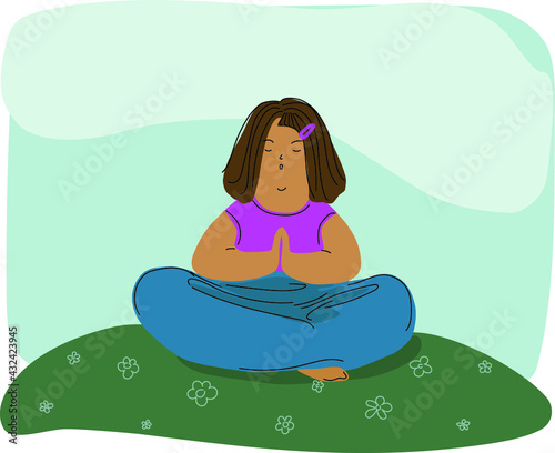 Girl does yoga in the nature and breathing the fresh air of spring