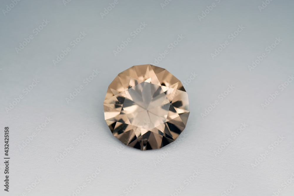 Natural genuine round faceted brown color smoky quartz transparent gemstone setting for making jewelry. Front view. Gradient background. Gemology theme. Natural genuine round faceted brown color smoky quartz transparent gemstone setting for making jewelry. Front view. Gradient background. Gemology theme.