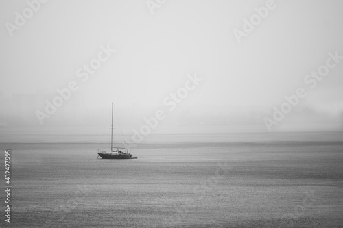 Sailboat on the rainy sea Black and White