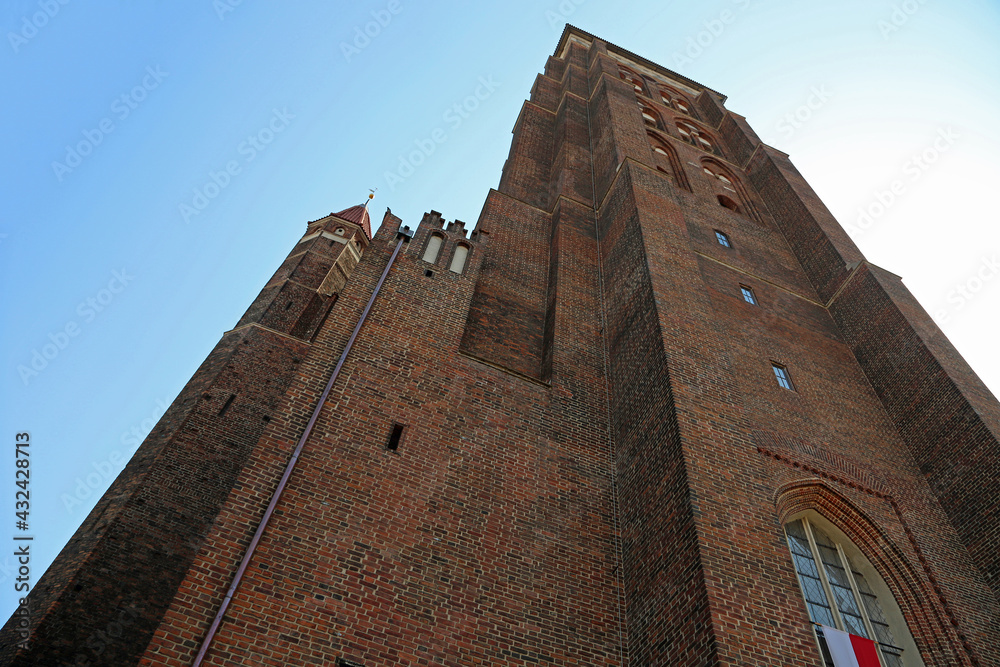 The tower of St Mary Church tower on blue sky - Gdansk, Poland