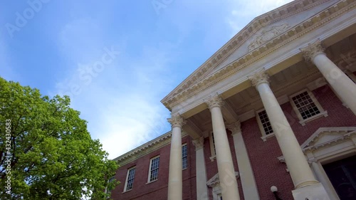 Panning footage of the Historical Maryland State Capitol building in Annapolis, the oldest state house that is still in use. Panning close up footage featuring the entrance and surrounding.