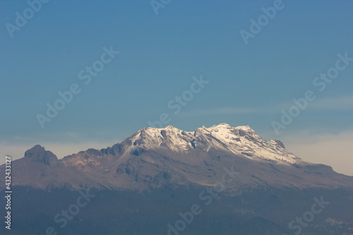 Top of Iztaccihuatl volcano covered with snow