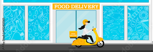  The courier delivers food on a yellow scooter from the store. Fast food delivery from the store. 