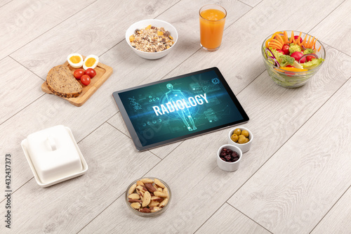 Tablet Pc with fruits, medical concept