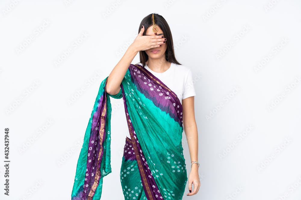 Young Indian woman isolated on white background covering eyes by hands. Do not want to see something Young Indian woman isolated on white background covering eyes by hands. Do not want to see something