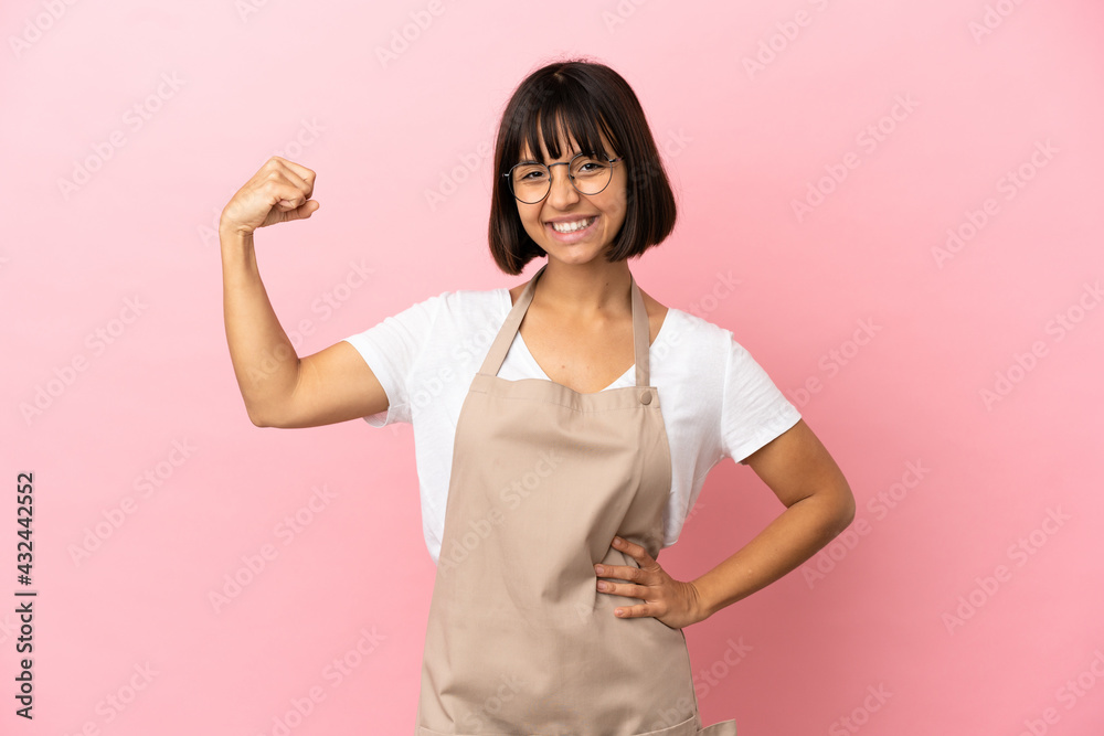 Restaurant waiter over isolated pink background doing strong gesture Restaurant waiter over isolated pink background doing strong gesture