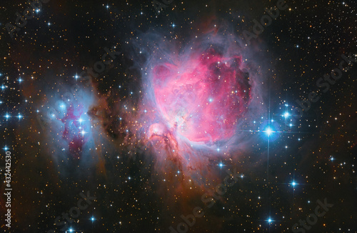Orion Nebula in the constellation Orion with colorful stars and vibrant colors in space seen through a telescope. M42 photo