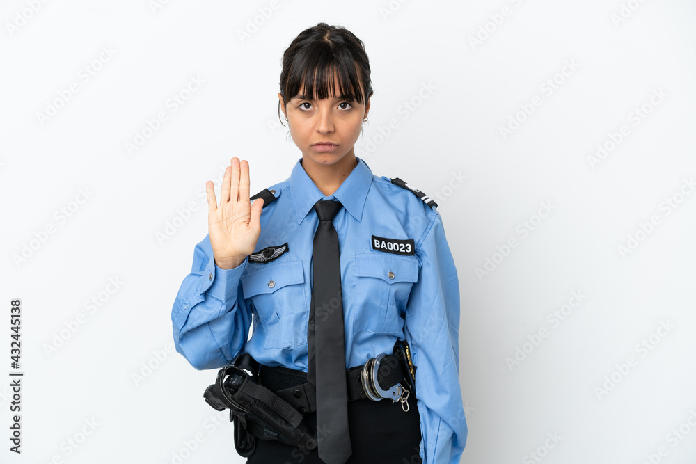 Young police mixed race woman isolated background making stop gesture
