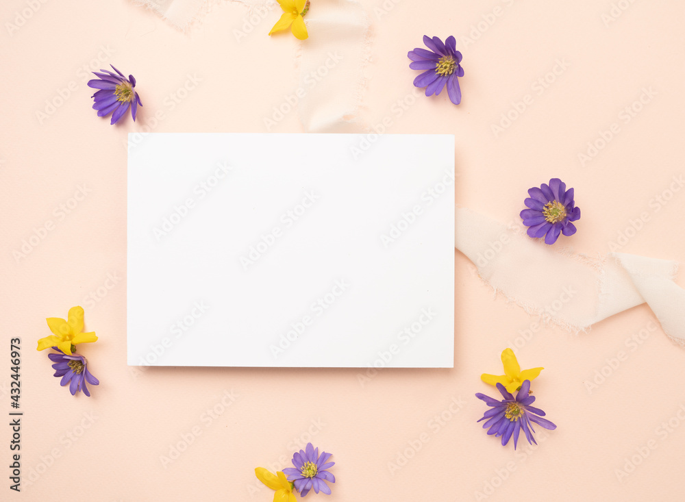 Beautiful purple blue and yellow flower blank stationery card flat lay