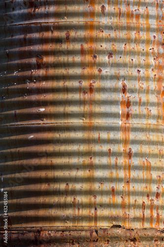 Old rusting corrugated water tank