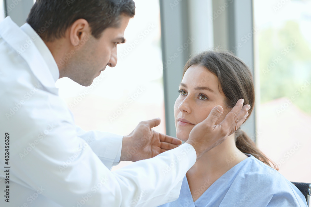 Ophthalmologist examining eyes of mature woman in clinic. Ophthalmologist examining eyes of mature woman in clinic.