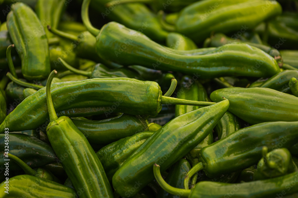 Close-up green vegetable for background, green pepper texture. Green peppers form a natural shape. Fresh raw vegetables Close-up green vegetable for background, green pepper texture. Green peppers form a natural shape. Fresh raw vegetables