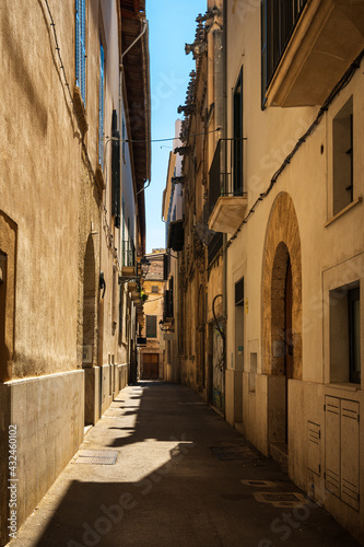 Narrow streets in Palma city on Mallorca island in Spain on a sunny summer day