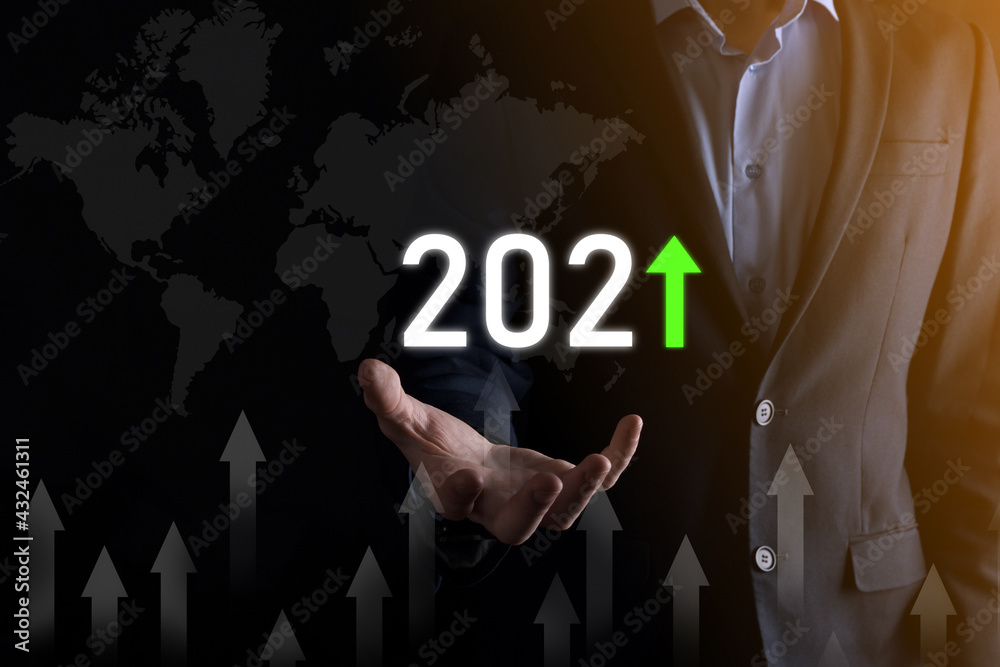 Business development to success and growing growth year 2021 concept.Plan business growth graph in year 2021 concept.Businessman plan and increase of positive indicators in his business Business development to success and growing growth year 2021 concept.Plan business growth graph in year 2021 concept.Businessman plan and increase of positive indicators in his business