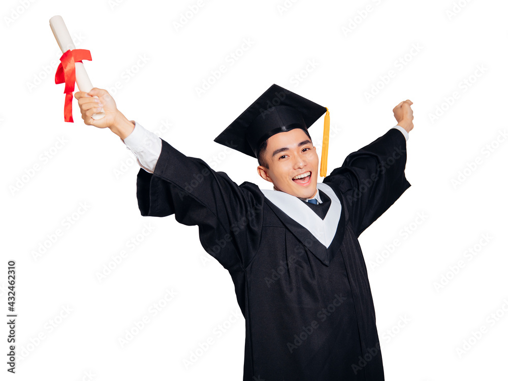 Excited young man in black graduation gown and cap showing diploma Excited young man in black graduation gown and cap showing diploma