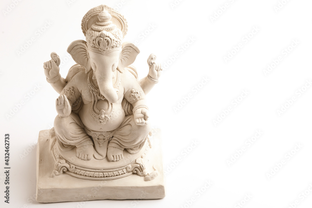 Statue of Lord Ganesha Made from plaster of Paris without color on white background.