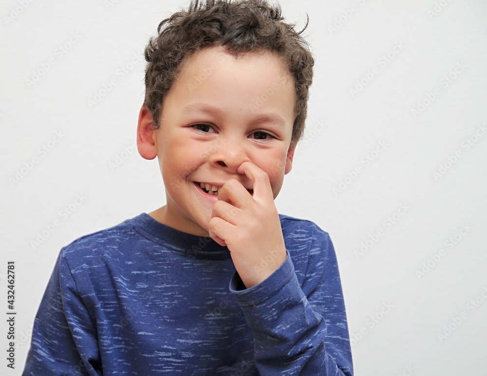 boy picking his nose with white background stock photo boy picking his nose with white background stock photo