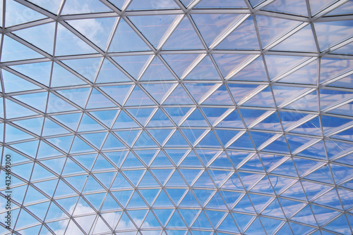 Glass roof of modern building windows.