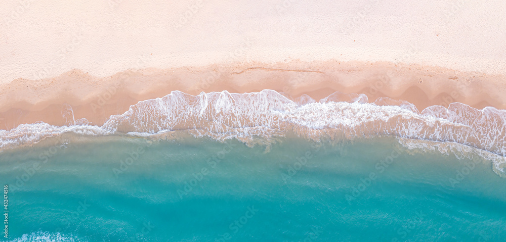Panorama top view of blue aqua sea and white sand. Capture sea wave and beach in summer by drone.	