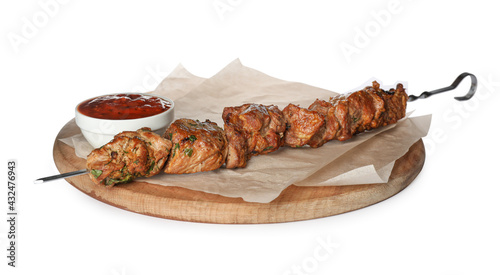 Фотография Metal skewer with delicious meat and ketchup on white background