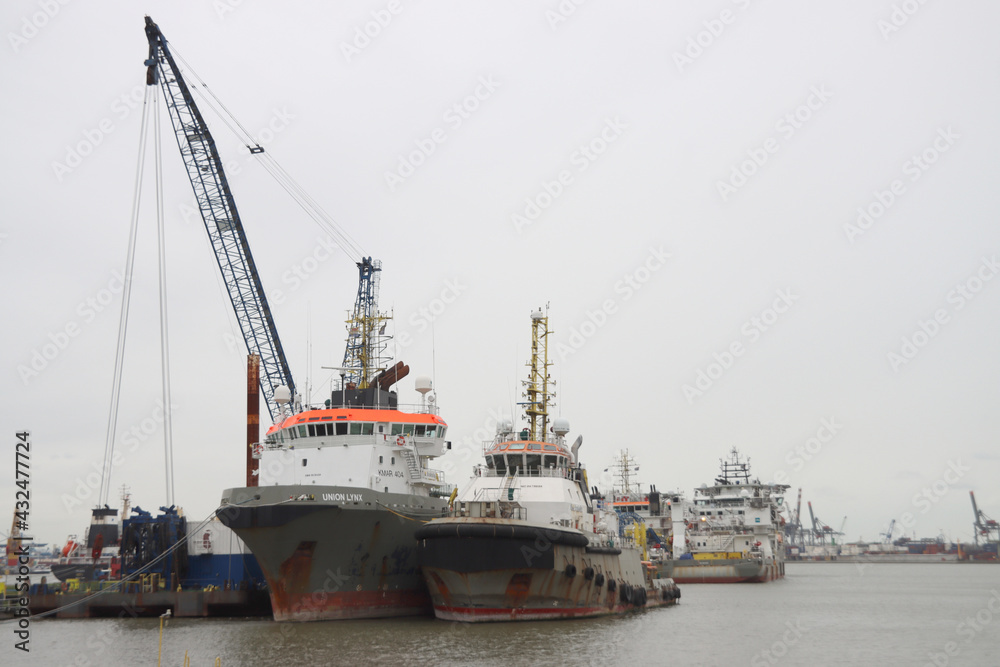 Boskalis dredging and cable-laying vessels in the Waalhaven harbor