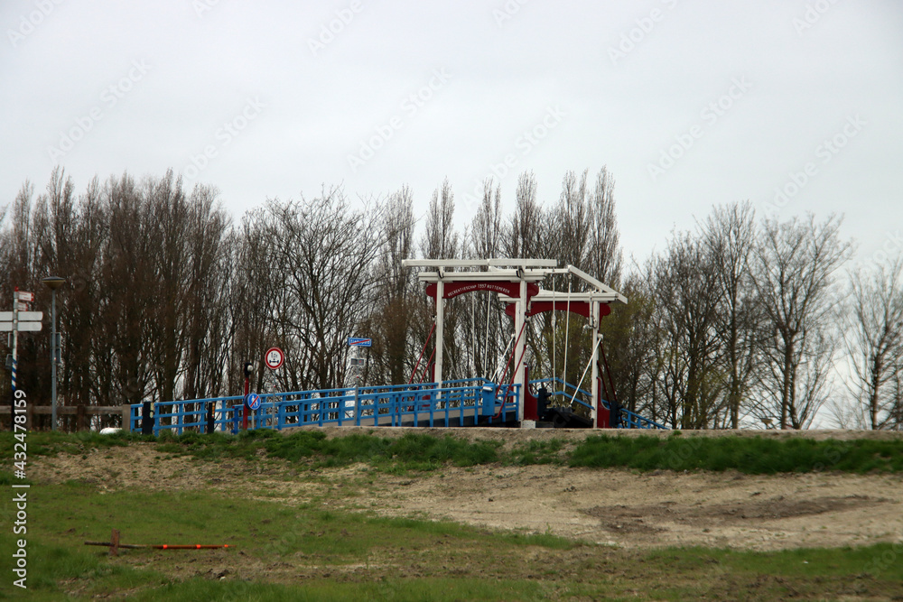 Wooden drawbridge named Pekhuisbrug over river Rotte Wooden drawbridge named Pekhuisbrug over river Rotte