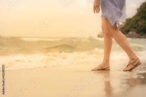 woman walking on the beach