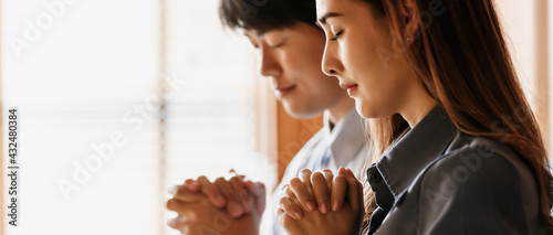 Photography Asian women and men are doing dua to remembering the teachings of Jesus And confess your sins before God