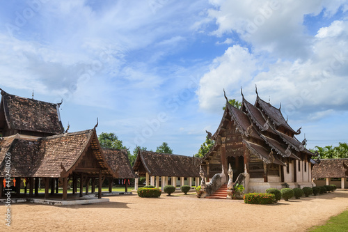 Beautiful traditional Lanna art wooden chapel church at Wat Intharawat or Ton Kwen Temple in Chiang Mai, Thailand