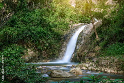 Beautiful waterfall in tropical forest in Chae Son National Park, Lampang, Thailand