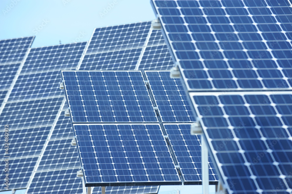 Almaty, Kazakhstan - 03.11.2016 : Solar panels of different sizes are lined up in a row to collect energy. Almaty, Kazakhstan - 03.11.2016 : Solar panels of different sizes are lined up in a row to collect energy.
