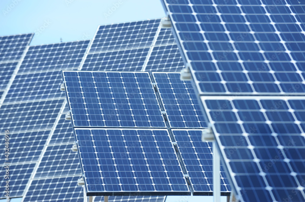 Almaty, Kazakhstan - 03.11.2016 : Solar panels of different sizes are lined up in a row to collect energy. Almaty, Kazakhstan - 03.11.2016 : Solar panels of different sizes are lined up in a row to collect energy.