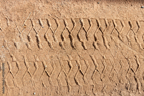 background of tire track mark in the sand