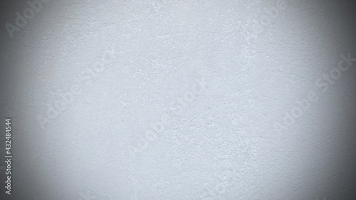 Seamless texture of white cement wall a rough surface, with space for text, for a background. Ready to use vignette.
