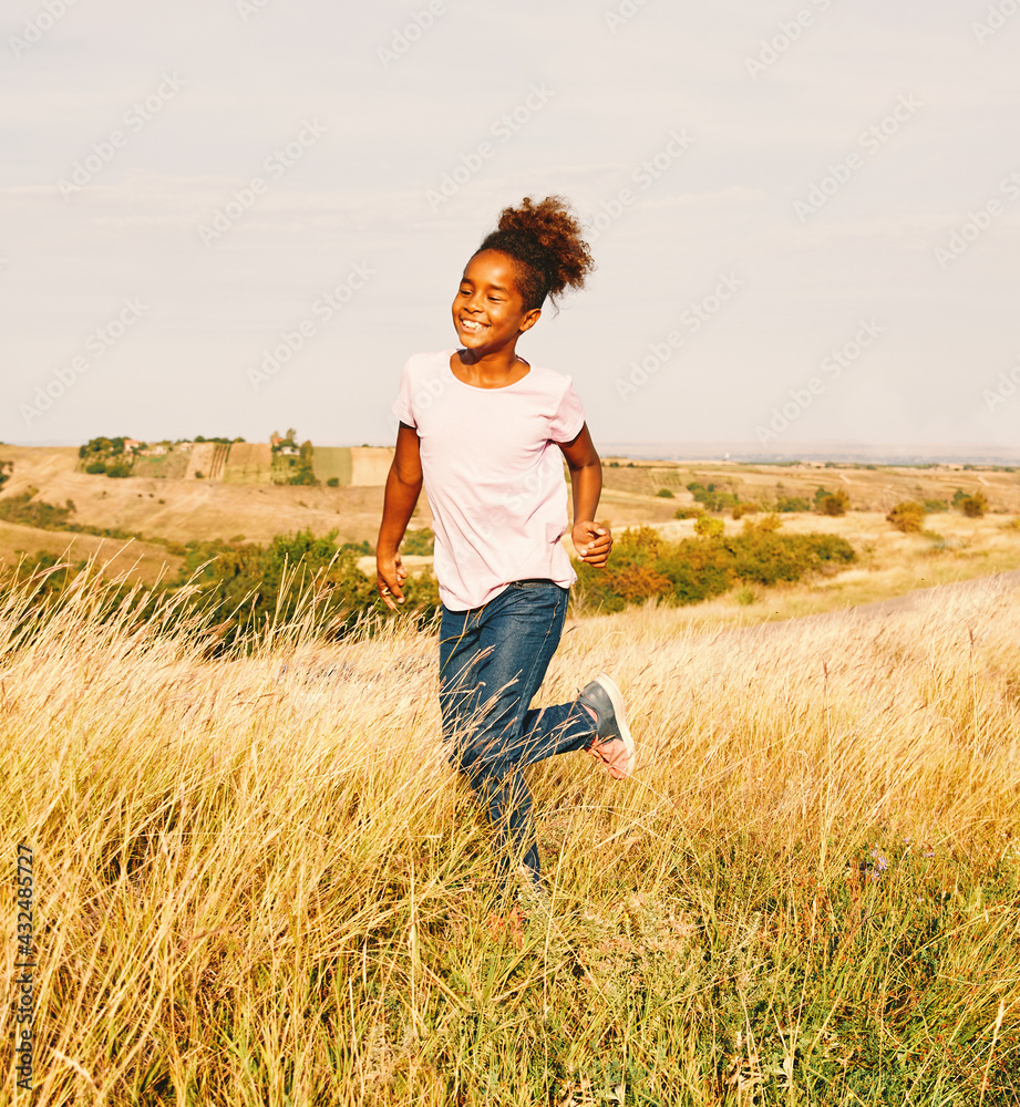 child daughter happy running active healthy carefree fun girl walking cheerful field outdoor nature summer