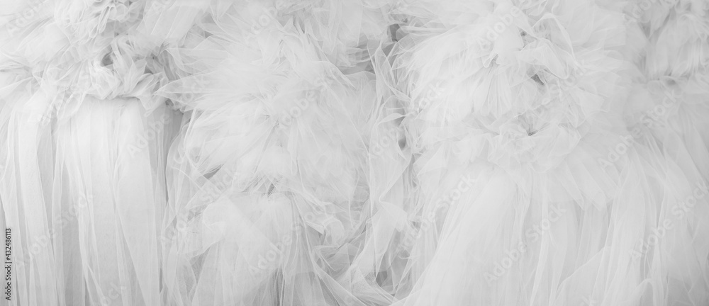 Beautiful folds of transparent fabric. Textile texture. Beautiful folds of transparent fabric. Textile texture.