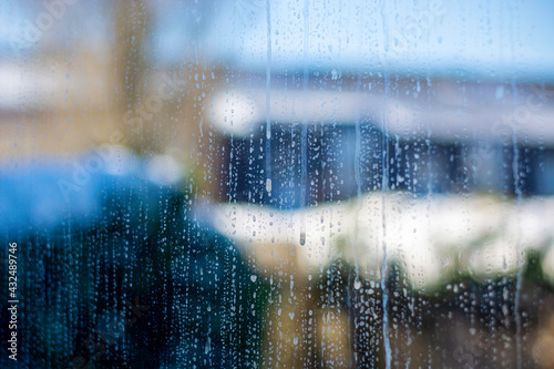 Canvas Print Close view of a distinctly dirty window glass showing grime, streaks and spots