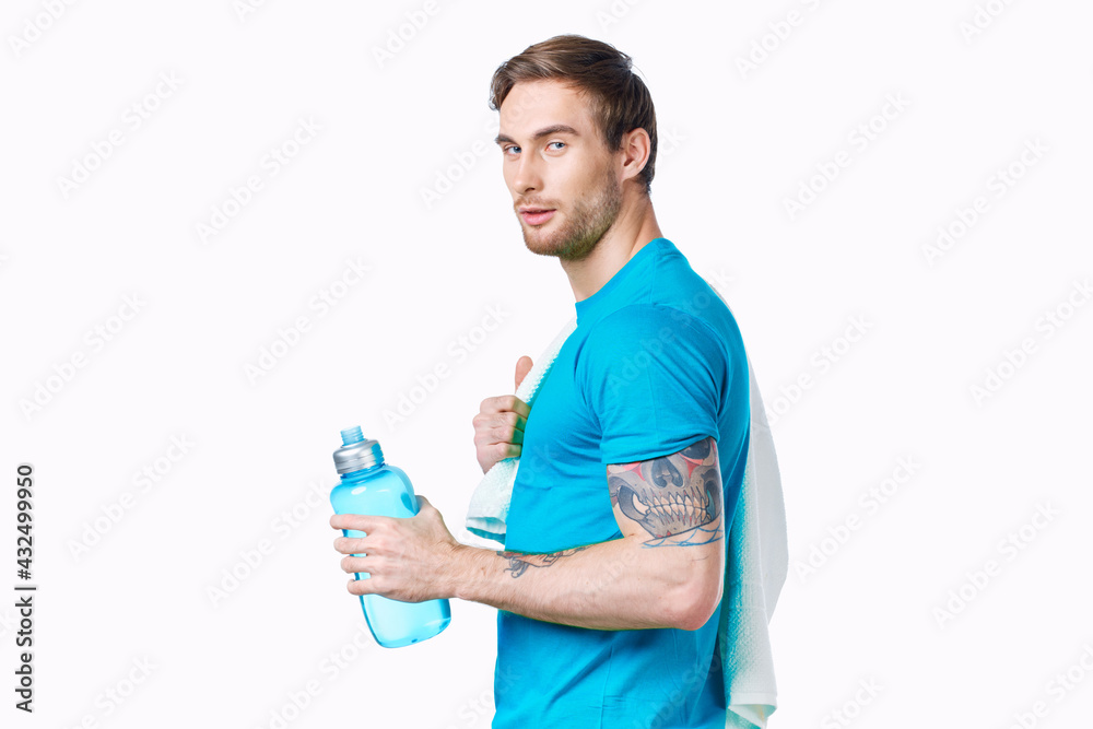 sporty man with towel on shoulders workout water bottle cropped view sporty man with towel on shoulders workout water bottle cropped view