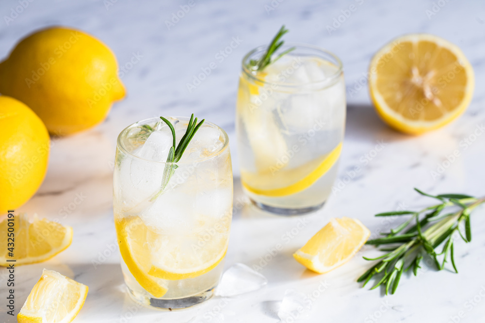 Lemon cocktail with rosemary and ice. Lemon cocktail with rosemary and ice.