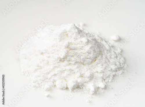 pile of baking powder closeup on white